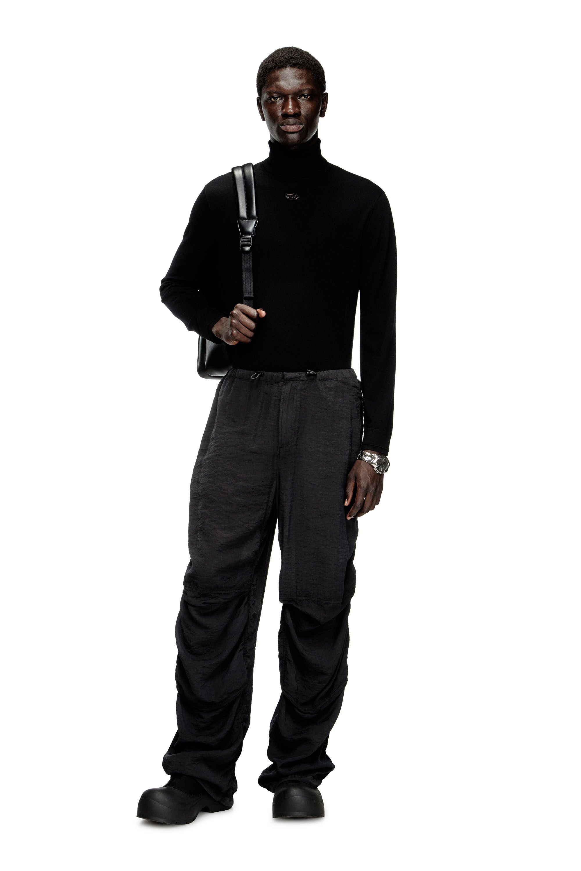 Diesel - K-VARTA, Pull à col roulé en laine avec logo ajouré Homme in Noir - 2