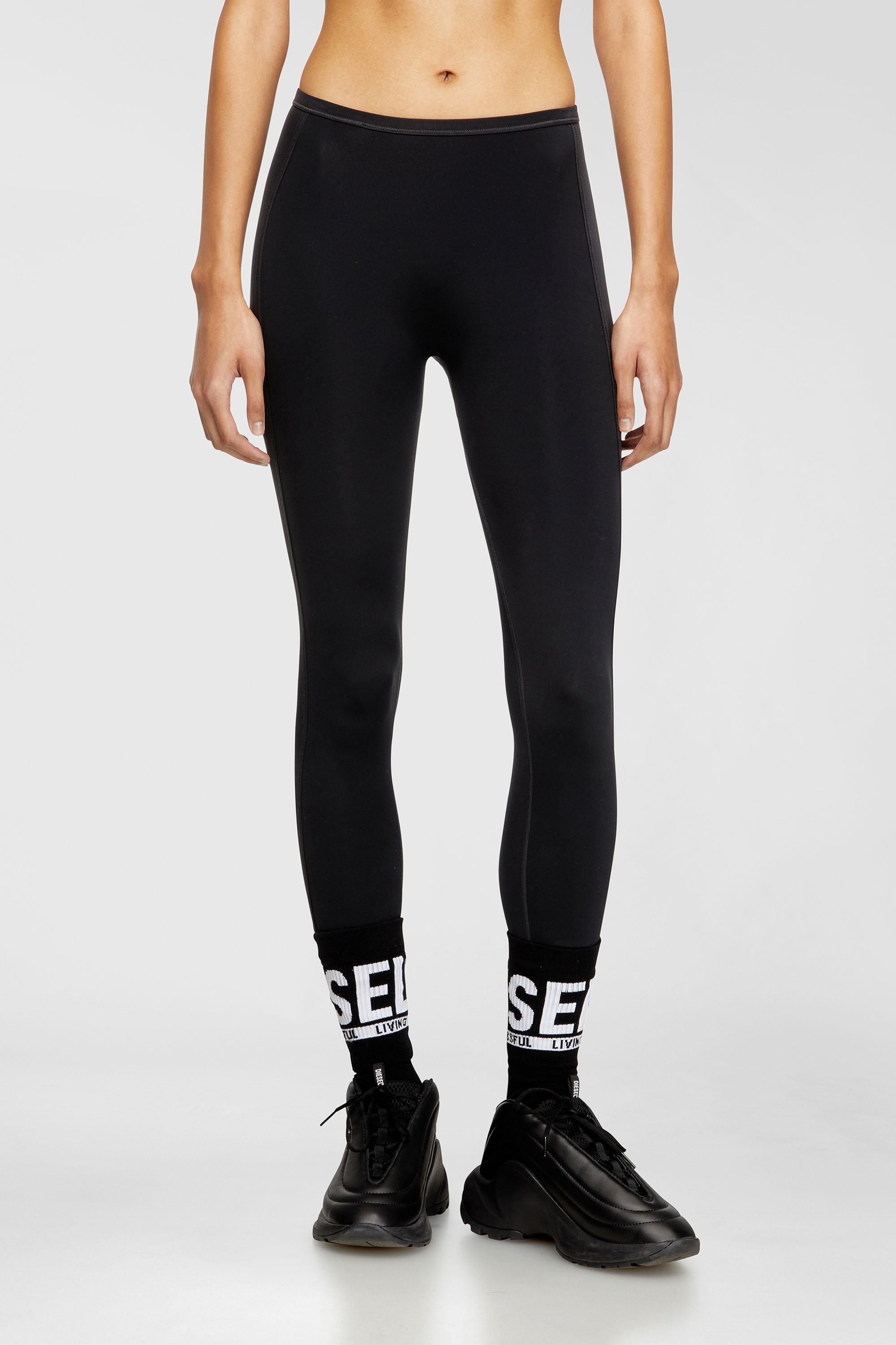 Diesel - MEREDITH-UTLT, Woman's Nylon leggings with cut-out back Oval D in Black - 5