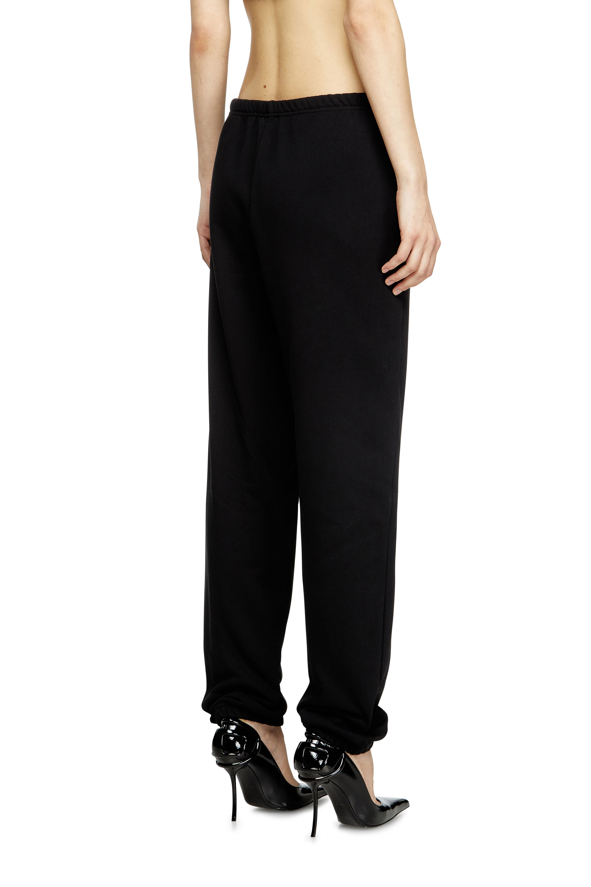 Diesel - P-LACYN-OD, Pantalon de survêtement avec logo Oval D effet métal Femme in Noir - 4