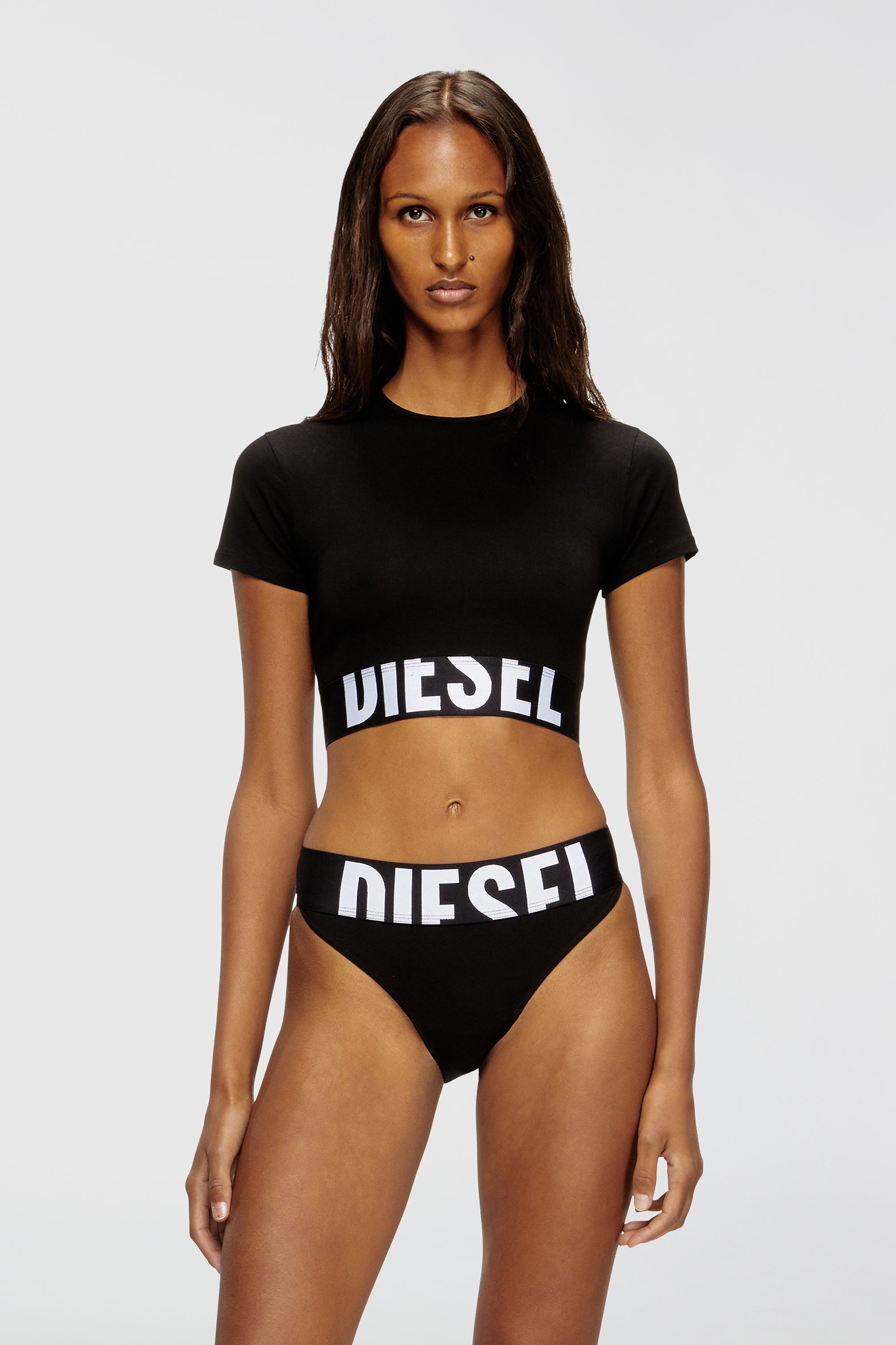Diesel - UFTEE-SPORT-CROPPED-T-SHIRT, Top crop sportif avec bande &agrave; logo Femme in Noir - 1