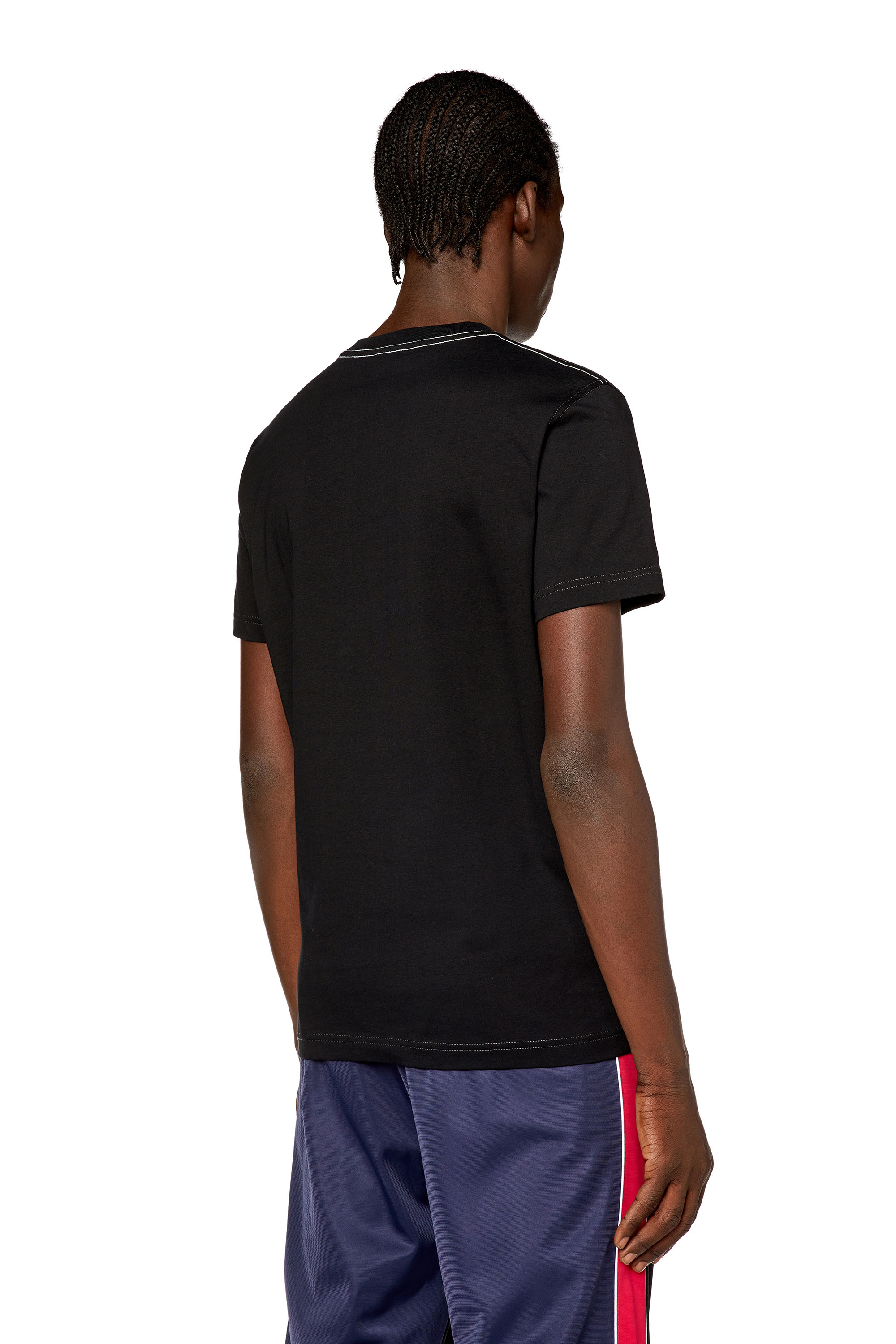 Diesel - T-DIEGOR-N1, T-shirt avec imprimé For Successful Living effet flou Homme in Noir - 4