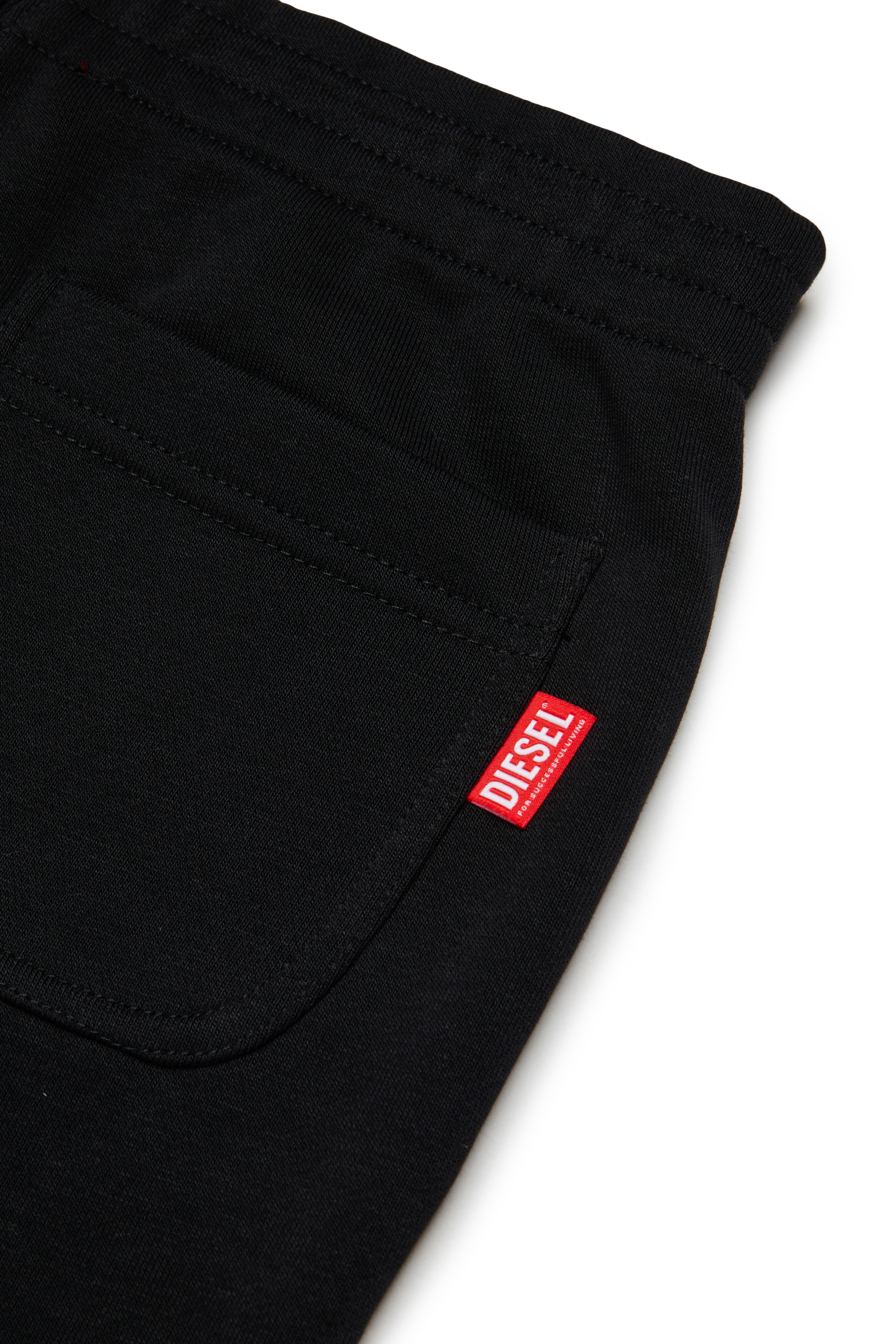 Diesel - PRES, Pantalon de surv&ecirc;tement avec logo d&eacute;coup&eacute; imprim&eacute; Homme in Noir - 4